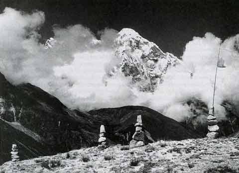 
Afternoon thermal clouds rise around Gauri Shankar, viewed from Menluntgse Base Camp in Tibet - Trekking in Tibet: A Traveler's Guide book
